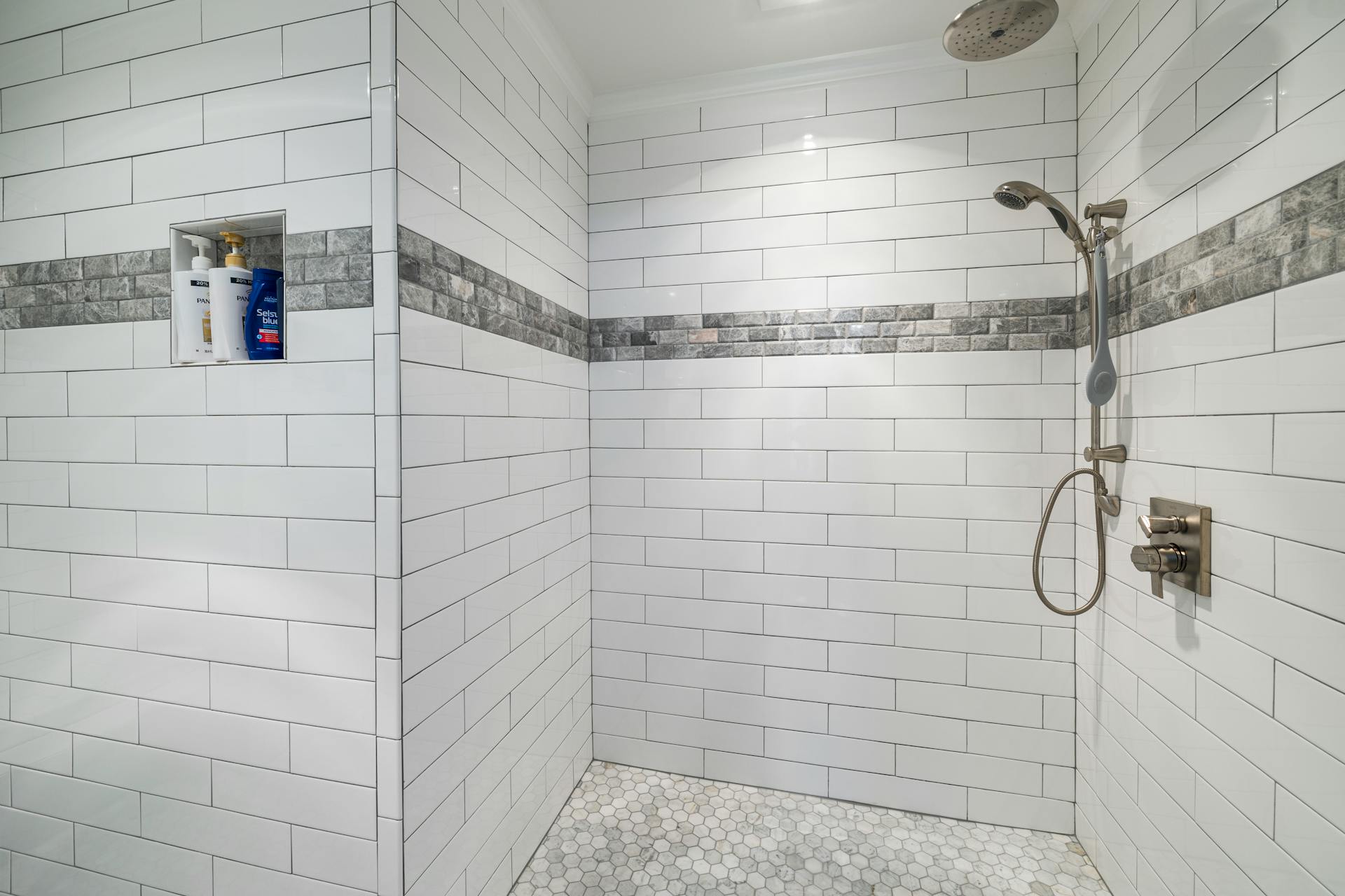 Tiled shower wall and grout joints — the wet-area surfaces checked in the Sydney Sealed 7-Point Leak Assessment