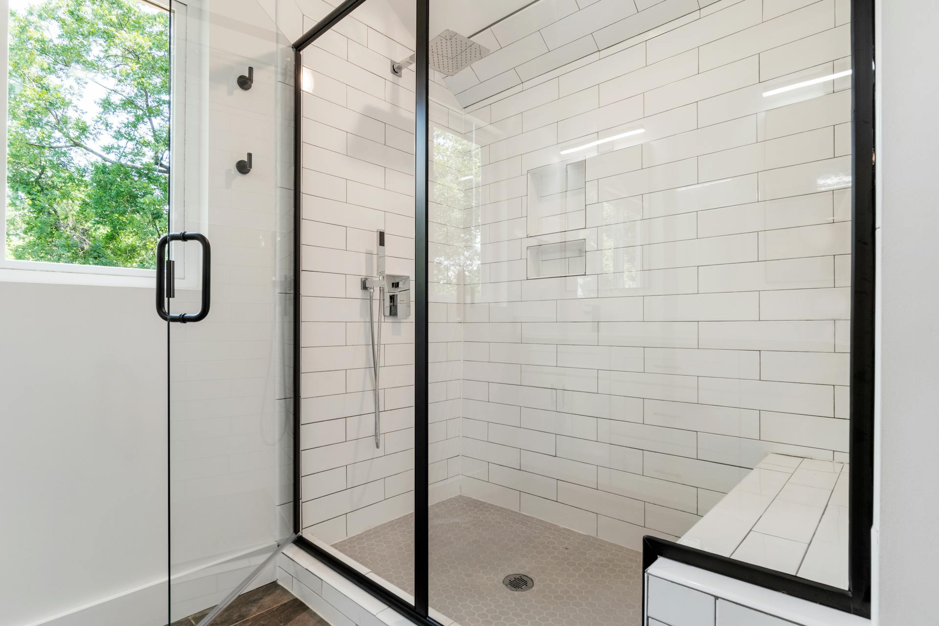 Freshly sealed modern tiled shower kept watertight by Sydney Sealed preventative maintenance